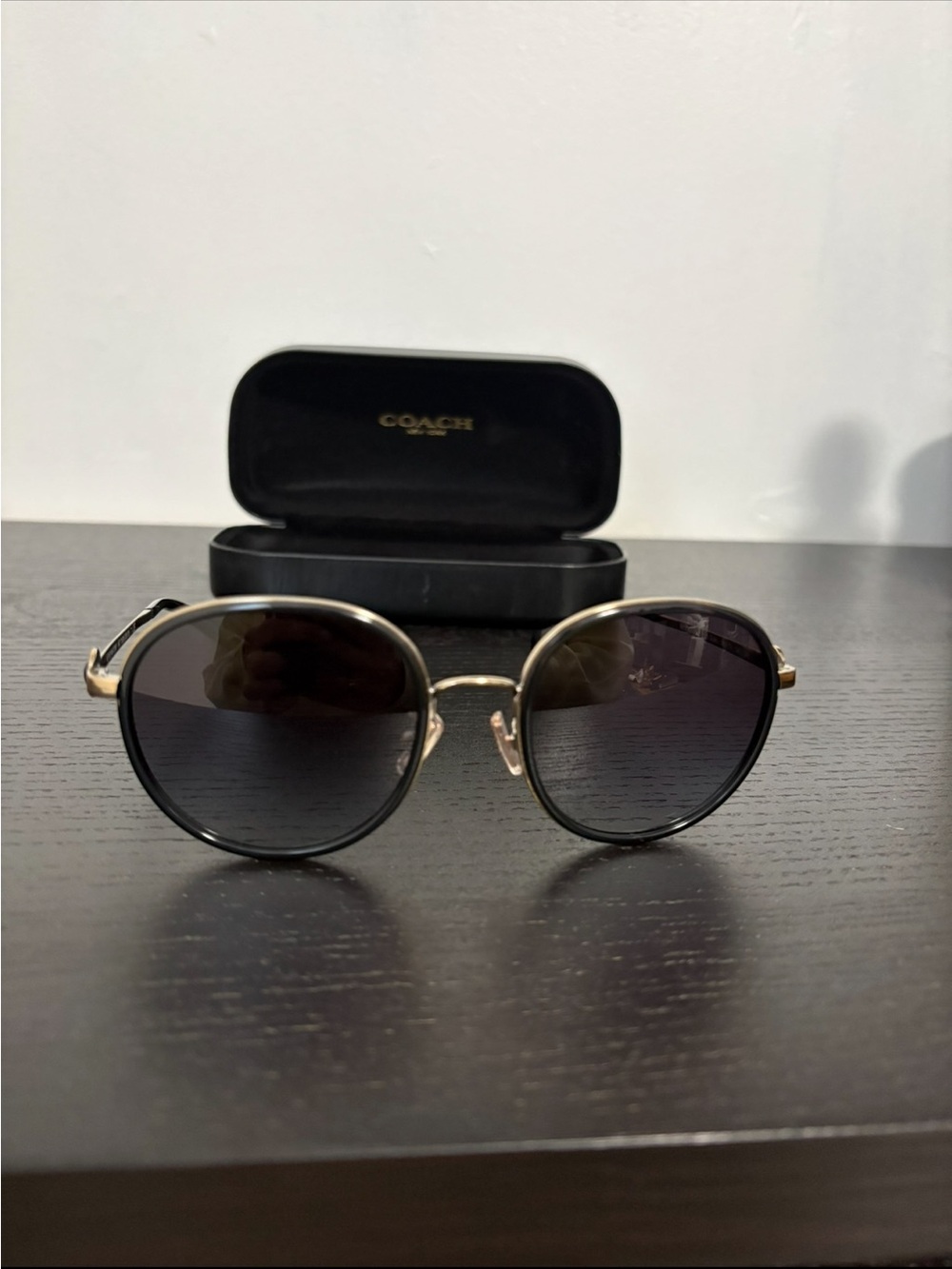 Coach Round Black Sunglasses with Gold Accents